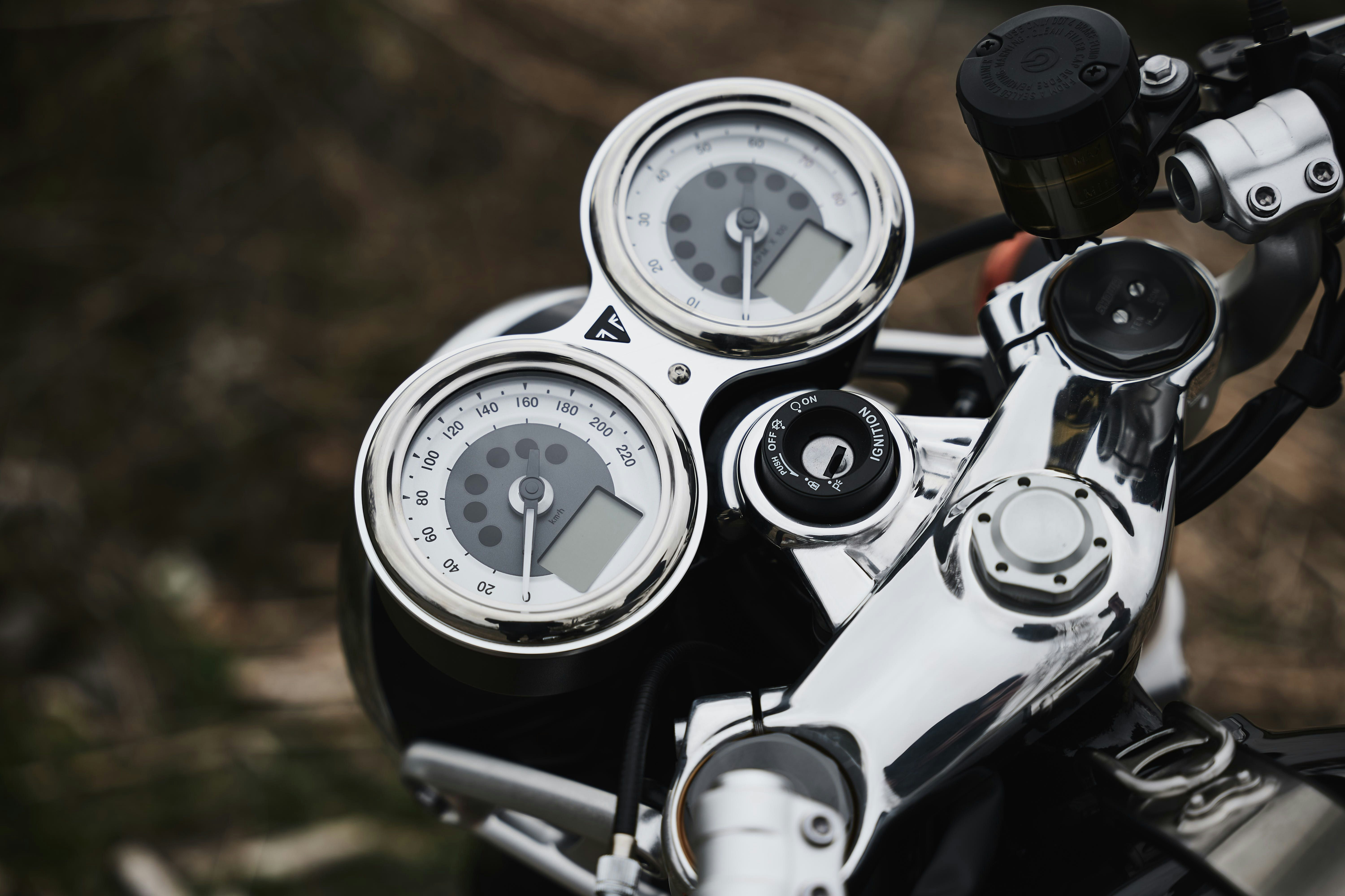 black and white motorcycle speedometer